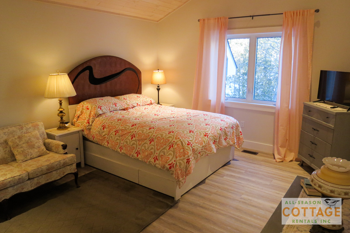 Bedroom #2 is located upstairs with a Queen bed